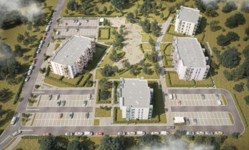 Zdjęcie przedstawia osiedle mieszkaniowe otoczone zielenią